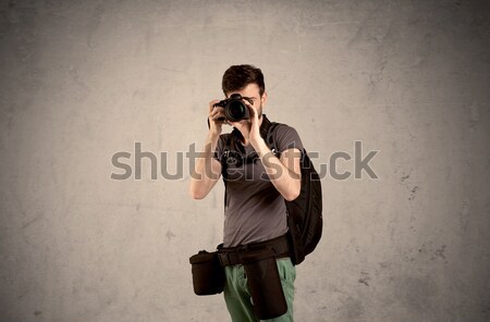 Hobby photographer holding camera Stock photo © ra2studio