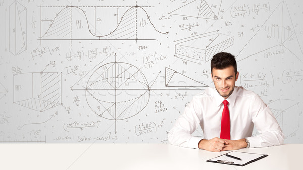 Businessman with business calculations background Stock photo © ra2studio