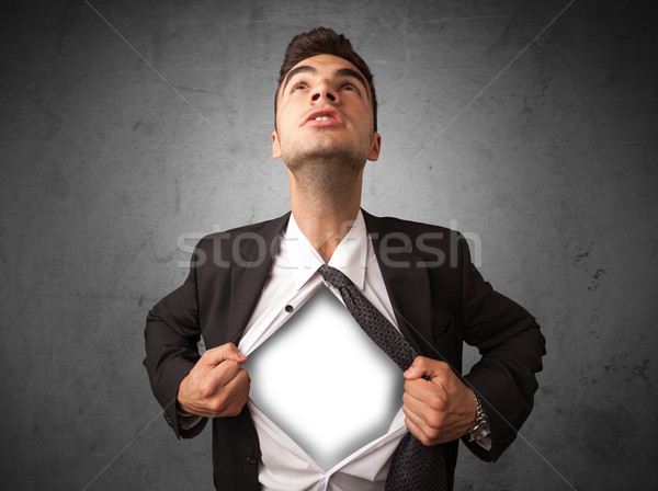 Businessman tearing off his shirt with white copyspace on chest Stock photo © ra2studio