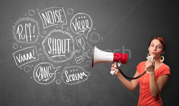 Pretty girl yelling into megaphone and hand drawn speech bubbles come out  Stock photo © ra2studio