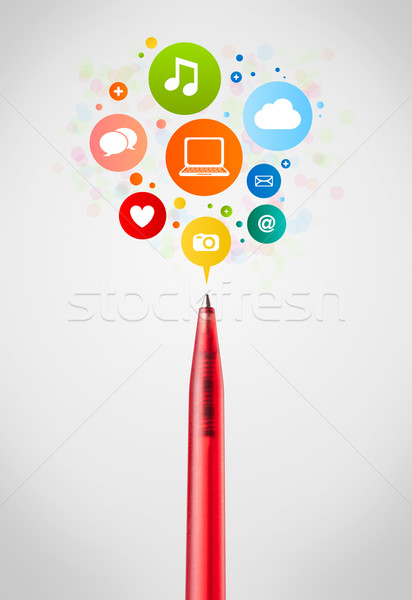 Pen close-up with social network icons Stock photo © ra2studio