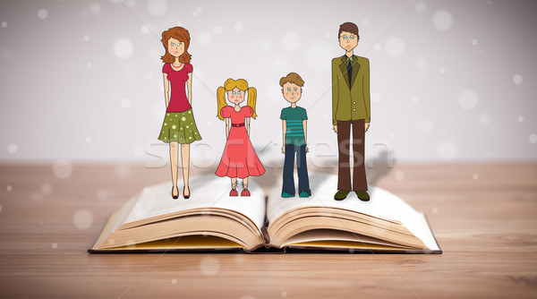 Drawing of a happy family on opened book Stock photo © ra2studio