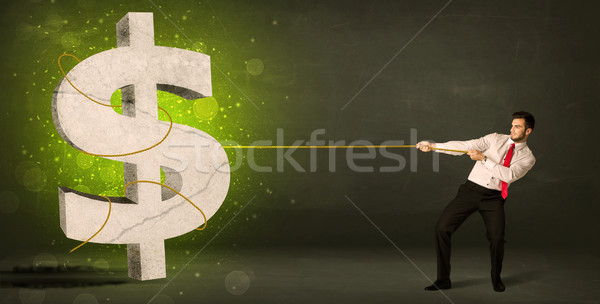 Uomo d'affari grande verde simbolo del dollaro soldi Foto d'archivio © ra2studio