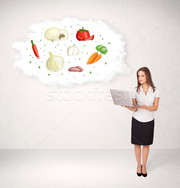 Young girl presenting nutritional cloud with vegetables  Stock photo © ra2studio