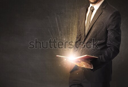 Business man with glowing exploding head Stock photo © ra2studio