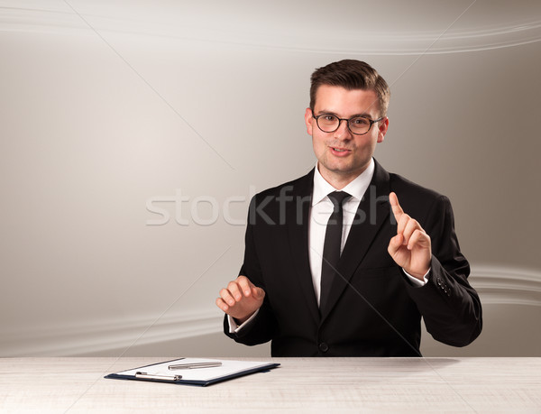 Televison host in live show with blank background Stock photo © ra2studio