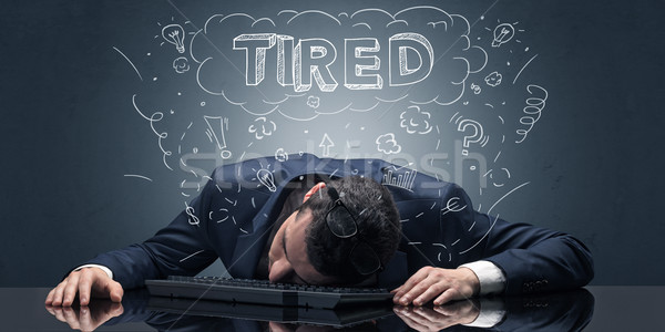 Businessman fell asleep at his workplace with ideas, sleep and tired concept Stock photo © ra2studio