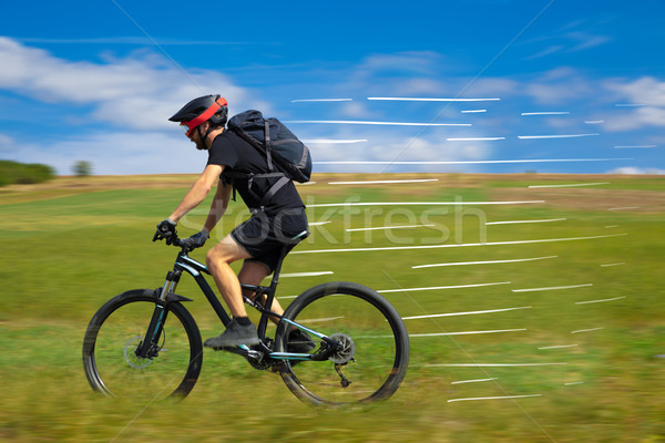Casual ciclista equitação bicicleta rápido Foto stock © ra2studio