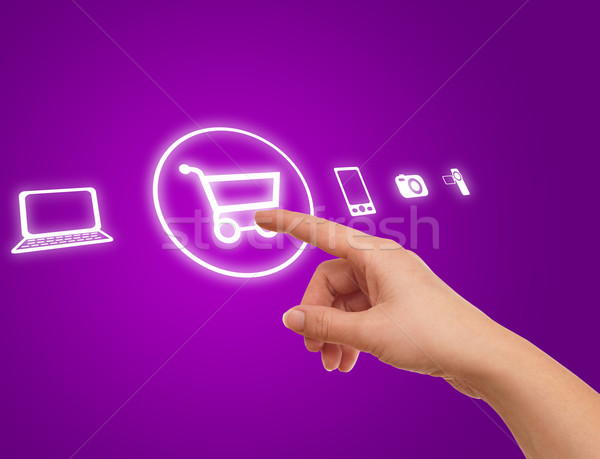 Stock photo: hand choosing shopping cart symbol