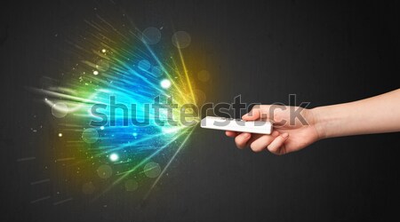 Stock photo: Painter working with airbrush and paints colorful paint