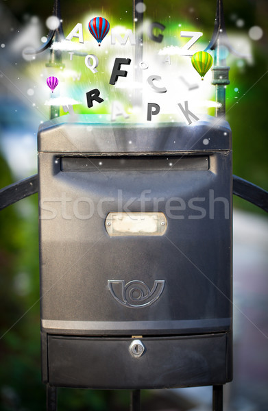 Post box with colorful letters Stock photo © ra2studio