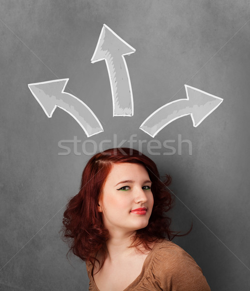 Jeune femme pense au-dessus tête joli [[stock_photo]] © ra2studio