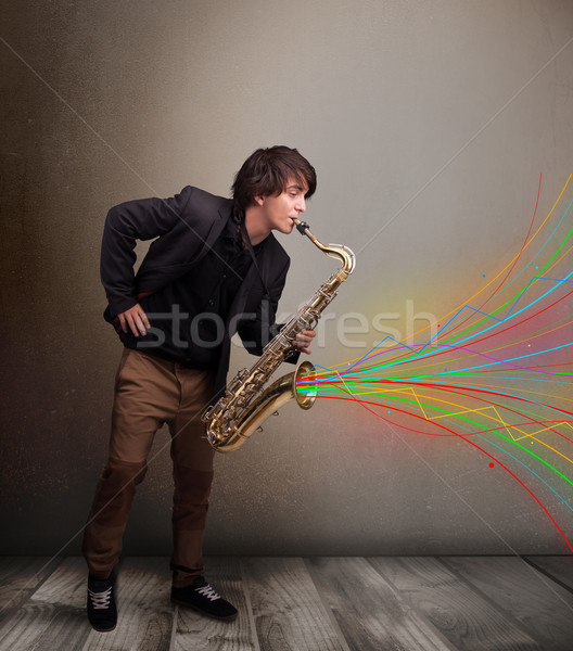 Foto stock: Atractivo · músico · jugando · saxófono · colorido · resumen