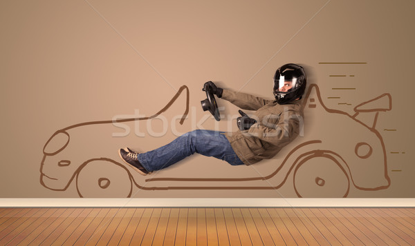 Heureux homme conduite dessinés à la main voiture mur [[stock_photo]] © ra2studio