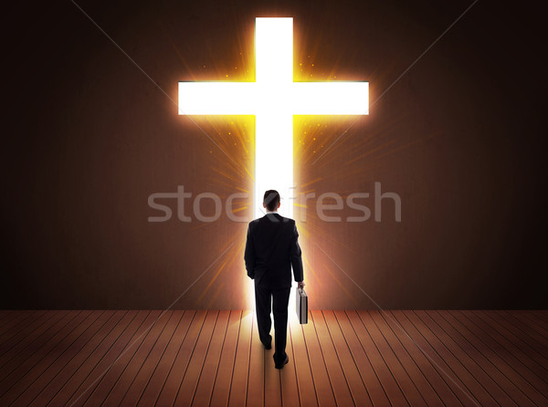 Hombre mirando brillante cruz signo familia Foto stock © ra2studio