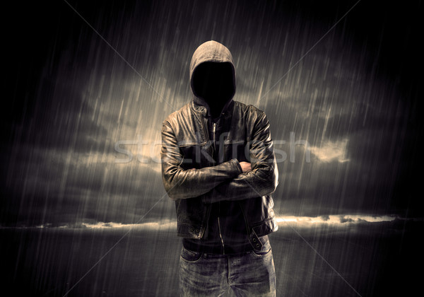 Anonymous terrorist in hoodie at night Stock photo © ra2studio