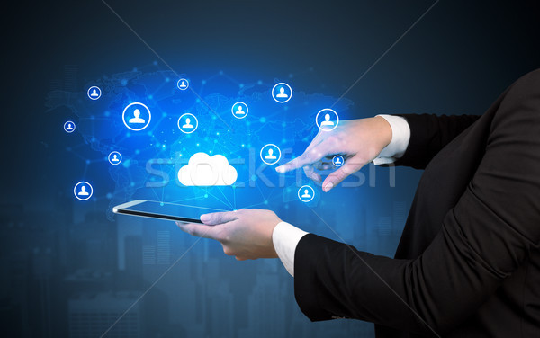 Cloud and connectivity concept on a tablet Stock photo © ra2studio