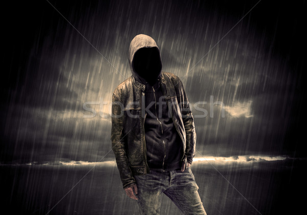 Anonymous terrorist in hoodie at night Stock photo © ra2studio