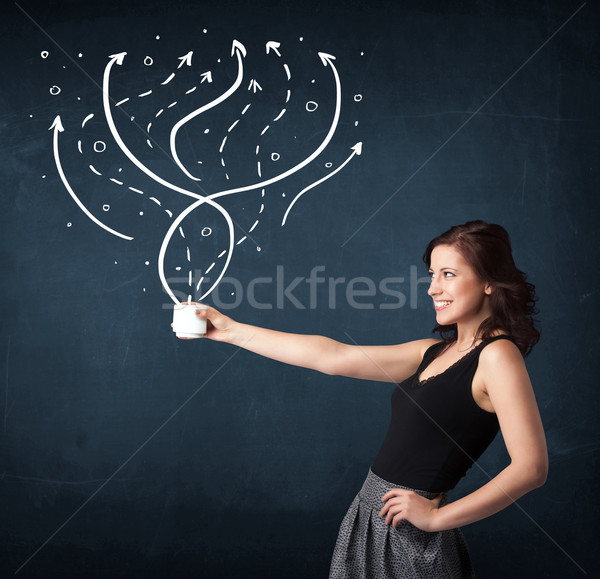 Businesswoman holding a white cup with lines and arrows Stock photo © ra2studio