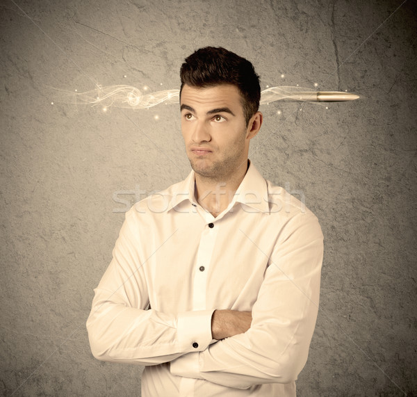 Fast creative sales guy with smoking bullet Stock photo © ra2studio