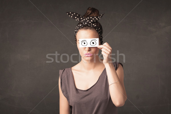 Funny woman looking with hand drawn paper eyes Stock photo © ra2studio