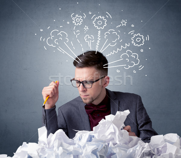 Businessman behind crumpled paper Stock photo © ra2studio