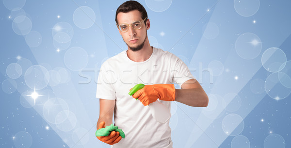 男 管家 藍色 清洗 房子 商業照片 © ra2studio