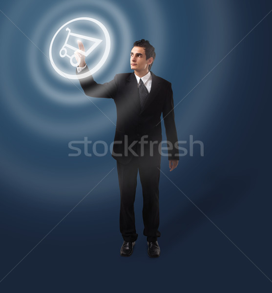 Business man pressing button Stock photo © ra2studio