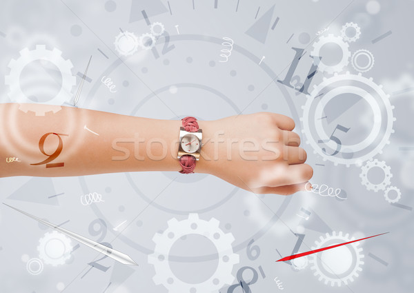 Hand with watch and numbers on the side comming out Stock photo © ra2studio