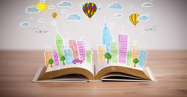 cityscape drawing on open book Stock photo © ra2studio