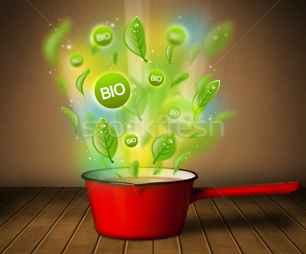 Stock photo: bio signs coming out from cooking pot