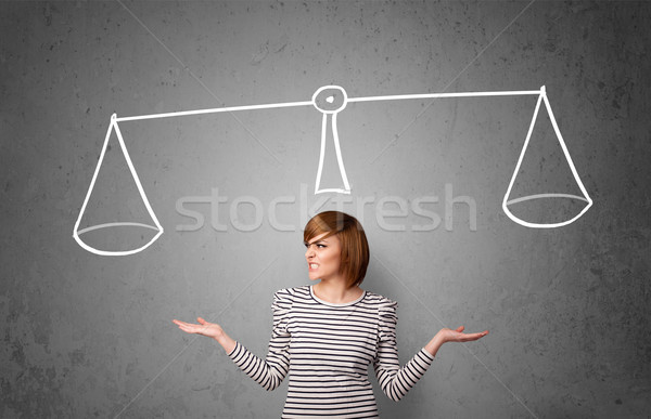 Young woman taking a decision Stock photo © ra2studio