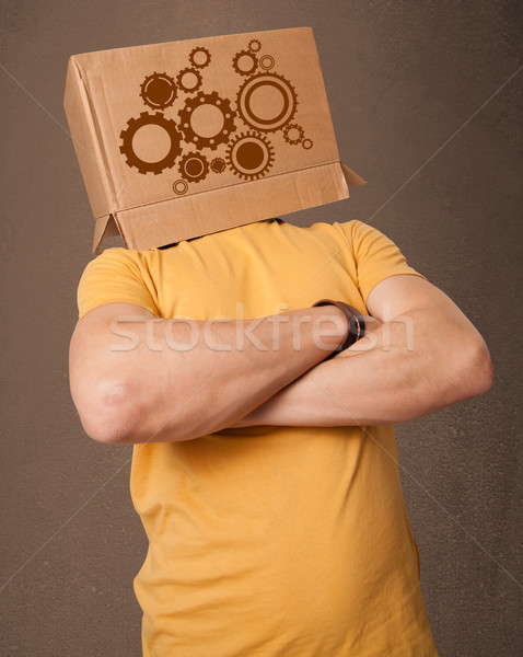 Foto stock: Joven · caja · de · cartón · cabeza · pie · cara