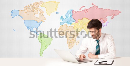 [[stock_photo]]: Homme · d'affaires · coloré · carte · du · monde · affaires · séance · blanche