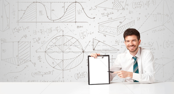 Businessman with business calculations background Stock photo © ra2studio