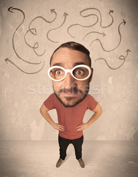 Big head person with arrows Stock photo © ra2studio