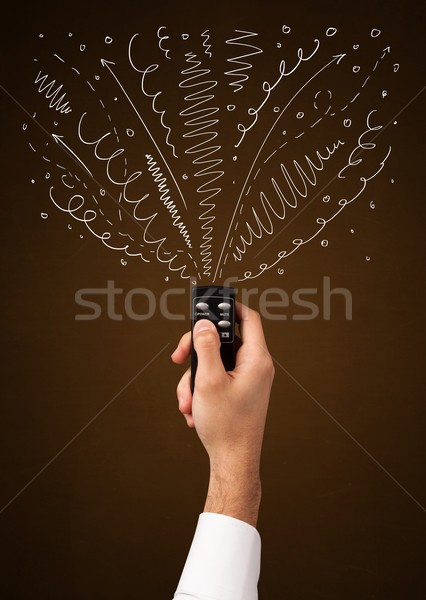 Hand afstandsbediening gekruld lijnen pijlen Stockfoto © ra2studio