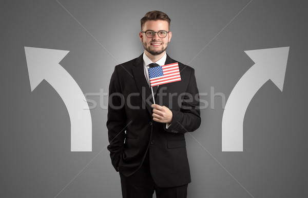 Handsome boy choosing target country Stock photo © ra2studio
