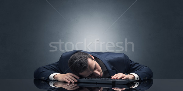 üzletember alszik munkahely fiatal copy space iroda Stock fotó © ra2studio