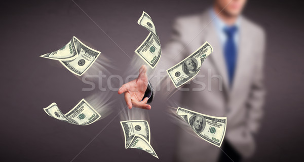Jonge man geld knap zakenman teken Stockfoto © ra2studio