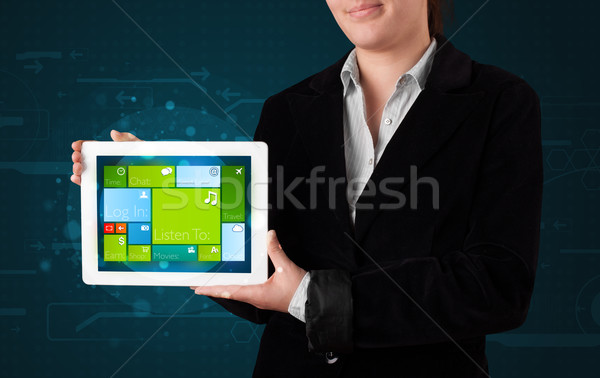 Lady holding tablet with modern software operational system Stock photo © ra2studio