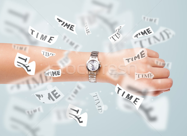 Clock and watch concept with time flying away Stock photo © ra2studio