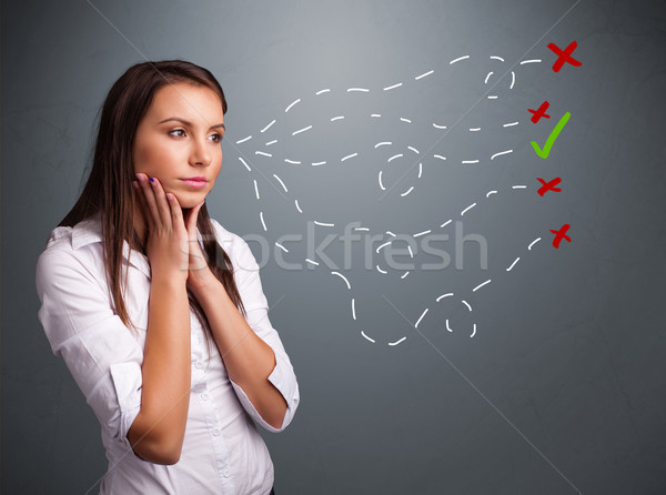 Young woman choosing between right and wrong signs Stock photo © ra2studio