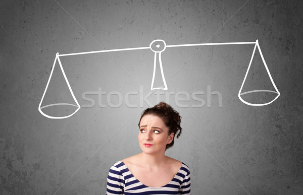 Young woman taking a decision Stock photo © ra2studio