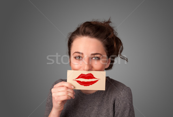 Heureux jolie femme carte baiser rouge à lèvres [[stock_photo]] © ra2studio