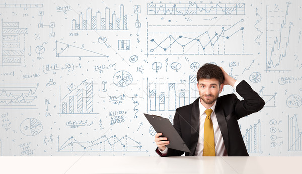 Businessman with diagram background Stock photo © ra2studio