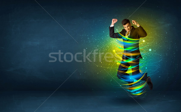 Podniecony człowiek biznesu skoki energii kolorowy linie Zdjęcia stock © ra2studio