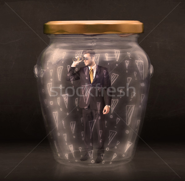 Business man trapped in jar with exclamation marks concept Stock photo © ra2studio