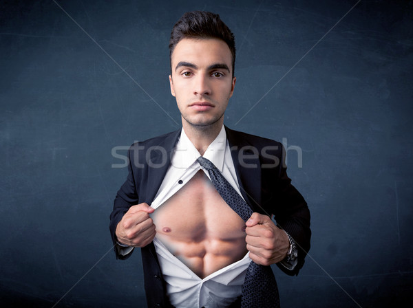 Businessman tearing off shirt and showing mucular body Stock photo © ra2studio