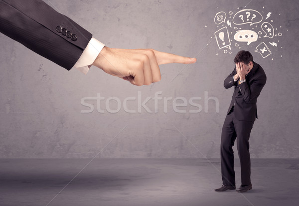 Stock photo: Boss hand pointing at confused employee